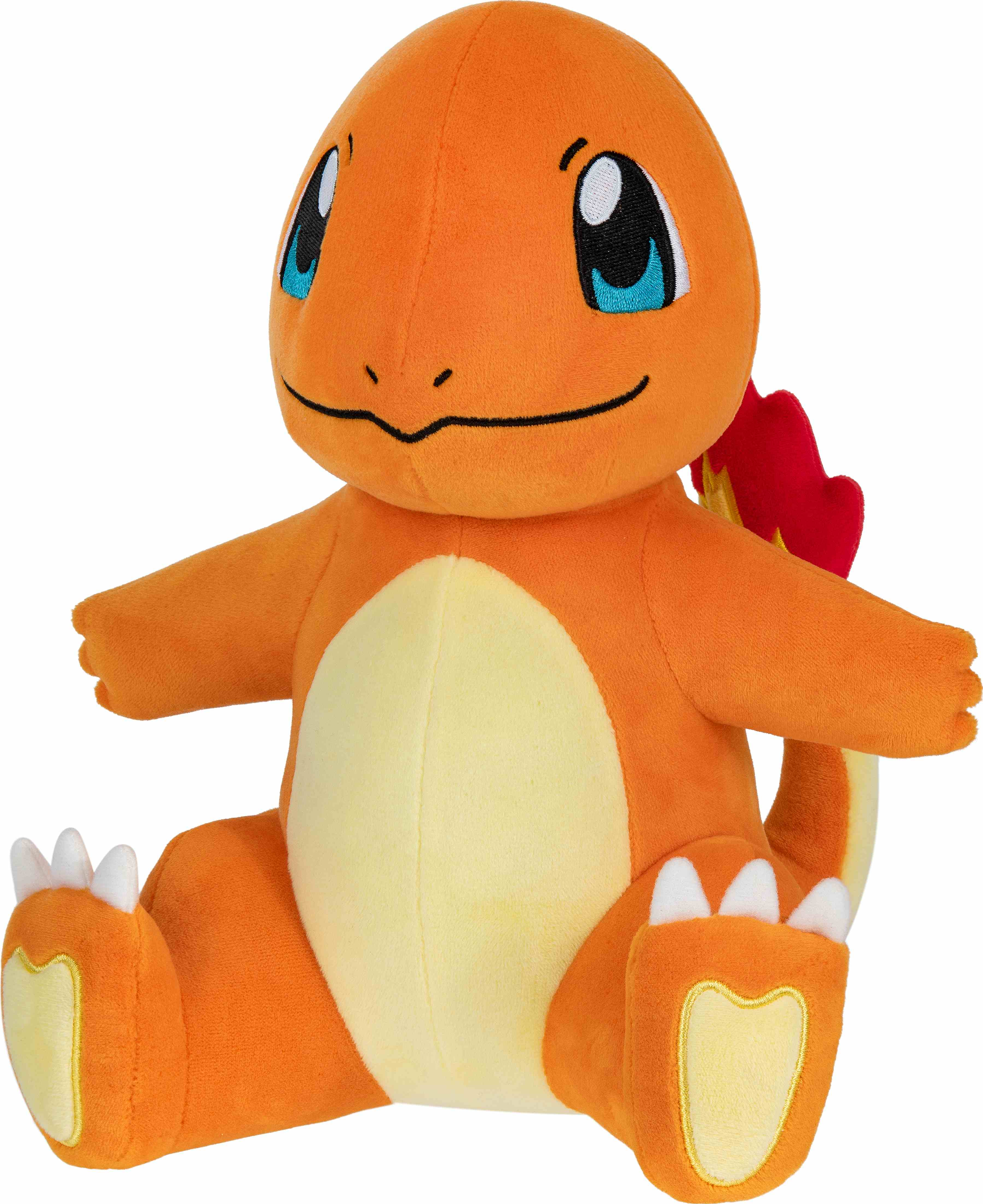 Peluche Charmander. Orange, flamme rouge sur la queue, assis, souriant.