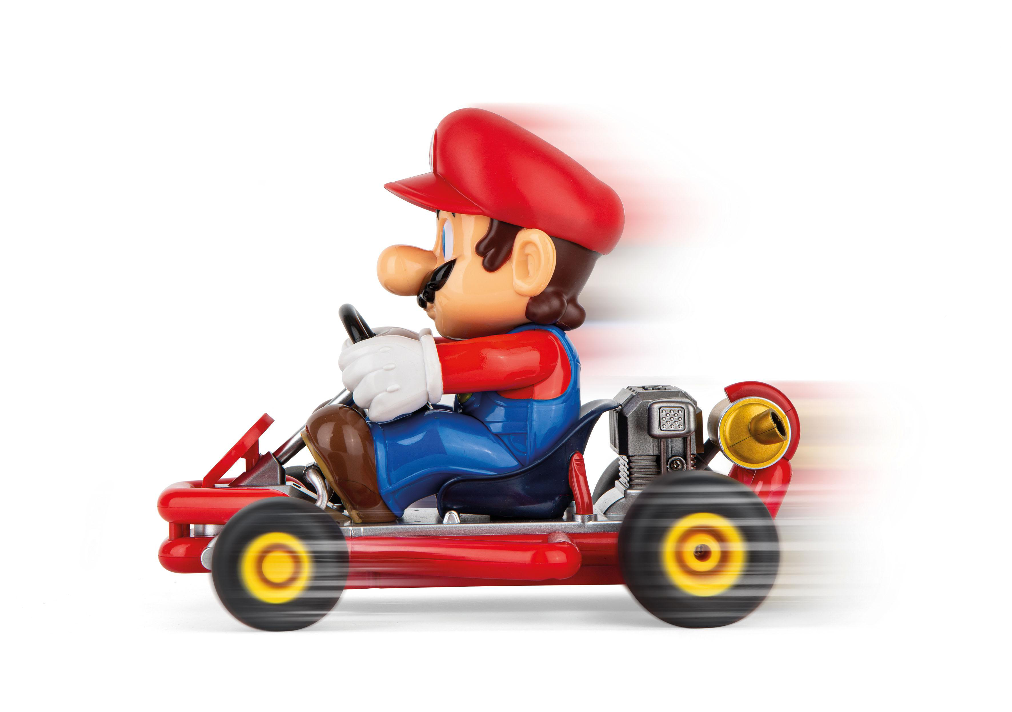 Mario fährt ein rotes Spielzeugauto. Geschwindigkeitslinien zeigen Bewegung.