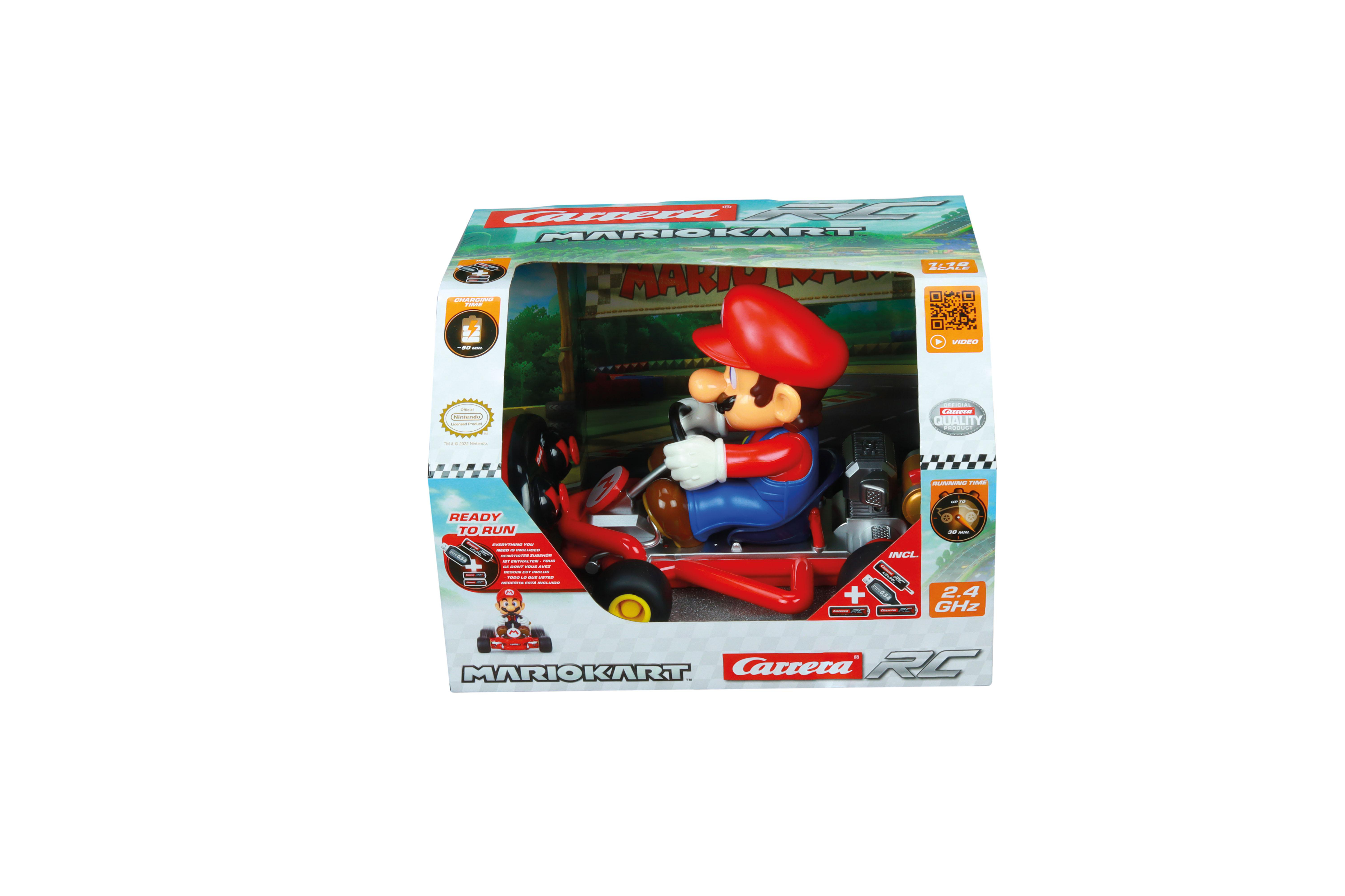 Mario Kart Spielzeug in einer Box. Mario in einem roten Kart, Box hat Grafiken einer Rennstrecke.