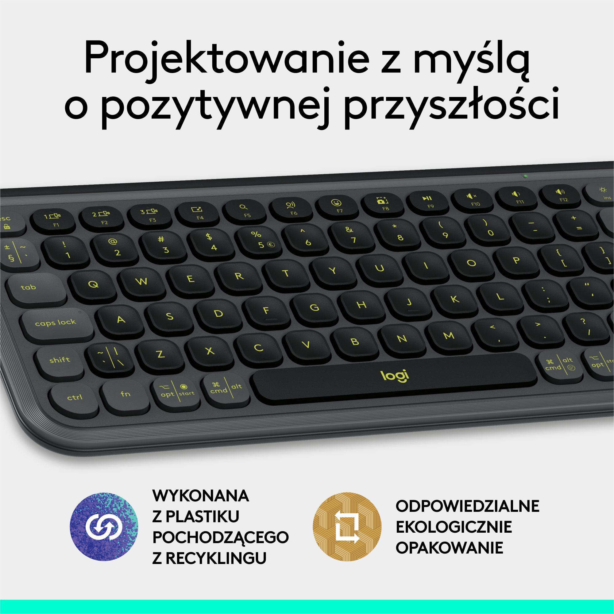 Czarna klawiatura z żółtymi klawiszami. Ma nowoczesny design i jest wykonana z plastiku pochodzącego z recyklingu.