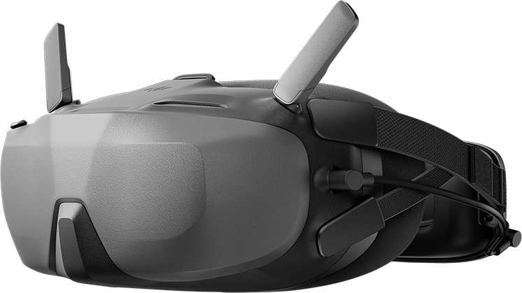 VR headset szürkeárnyalatban, két antennával és fejpánttal. Fekete és szürke színek.