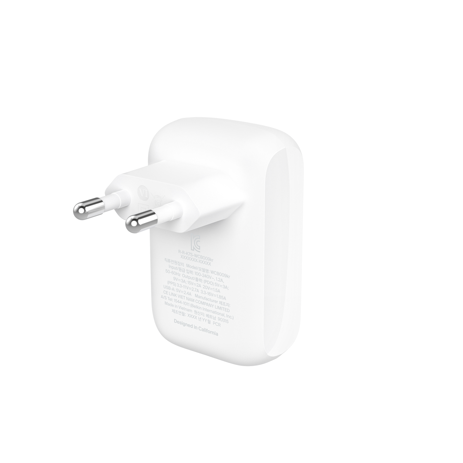 Adaptateur secteur blanc avec deux broches. Conçu en Californie.