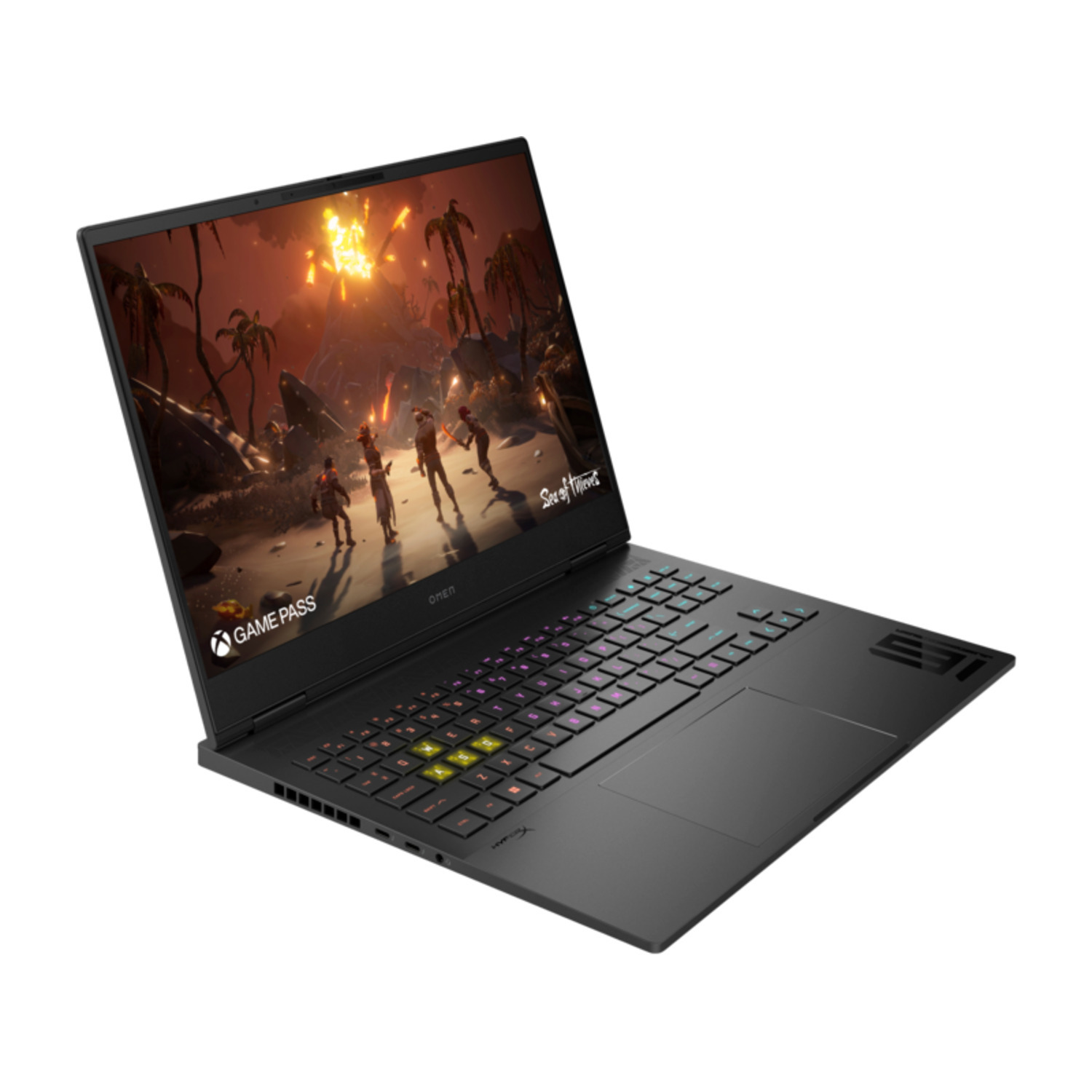 Ordinateur portable Omen noir affichant une scène de jeu avec des personnages et du feu. Le clavier a des touches colorées. L'ordinateur est sur une surface blanche.