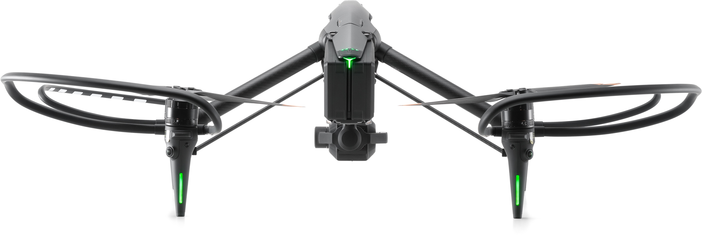 Eine schwarze Drohne wird von vorne gesehen. Sie hat vier Arme, jeweils mit Propeller und Landelichtern.