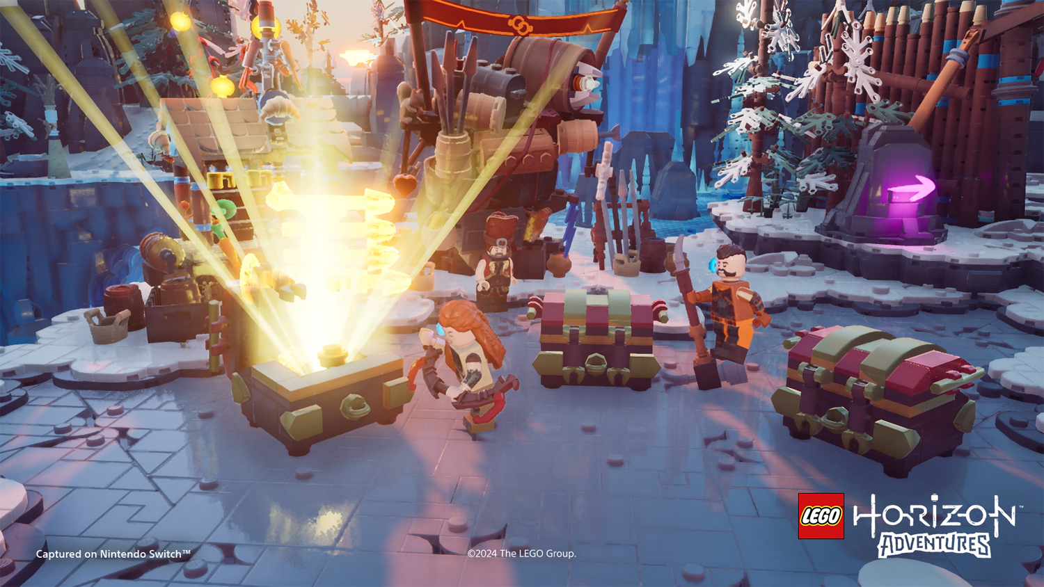 Lego Horizon Adventures Szene. Lego Figuren mit Truhe, Feuer und verschneitem Hintergrund.