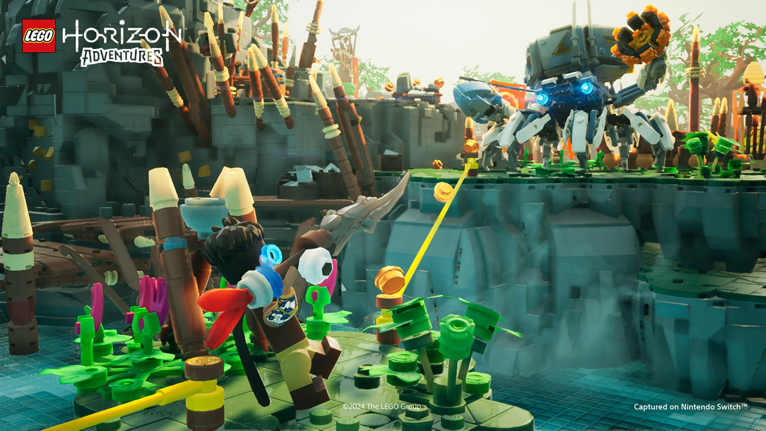 Lego Horizon Adventures Szene, mit Lego Figuren auf einer bunten Lego Landschaft.