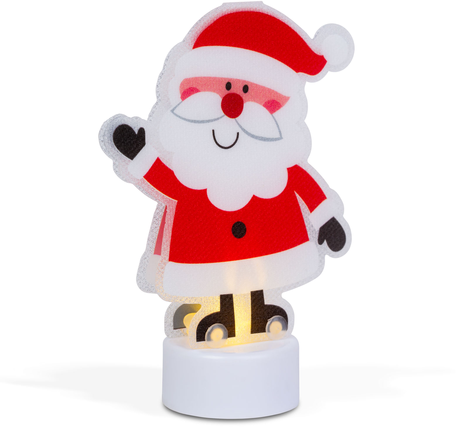 Mikulás figura integető kézzel, az aljáról megvilágítva.