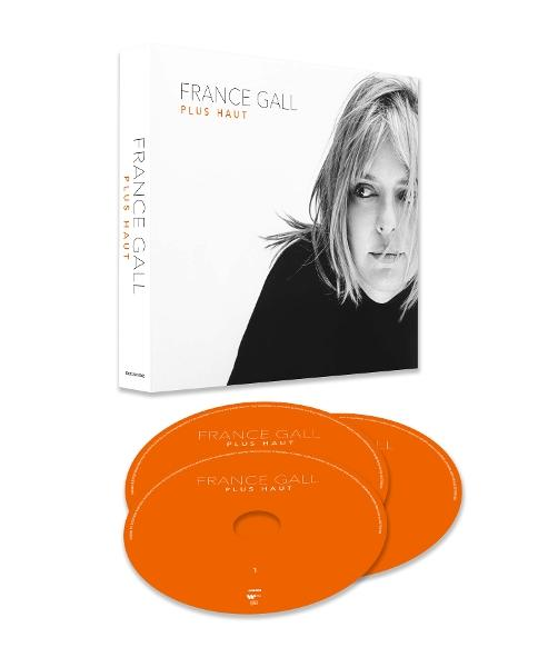CD-boxset van France Gall's album 'Plus Haut'. Met albumhoes en drie oranje cd's.