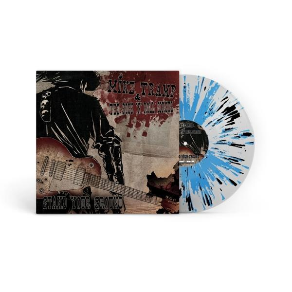 Vinil lemez album borítóval, gitározó férfival.