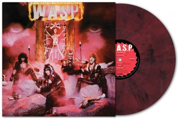 WASP album borító. A zenekar tagjai egy pokoli jelenetben, tűzzel és egy keresztre feszített figurával.