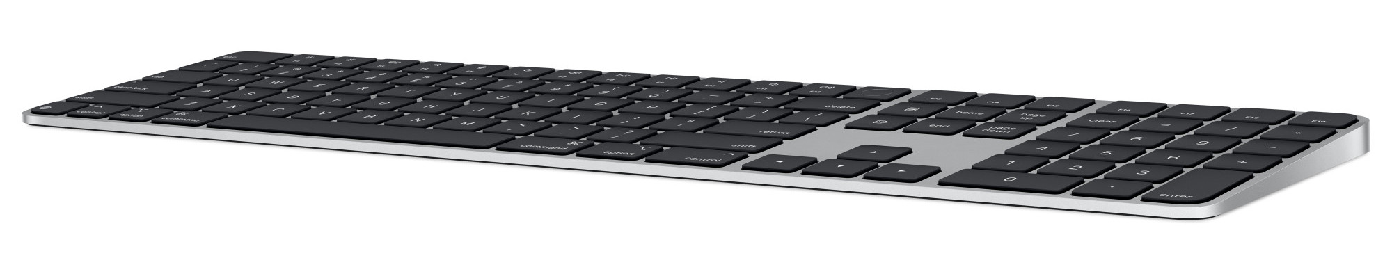 Srebrna i czarna klawiatura Apple Magic Keyboard na białym tle.