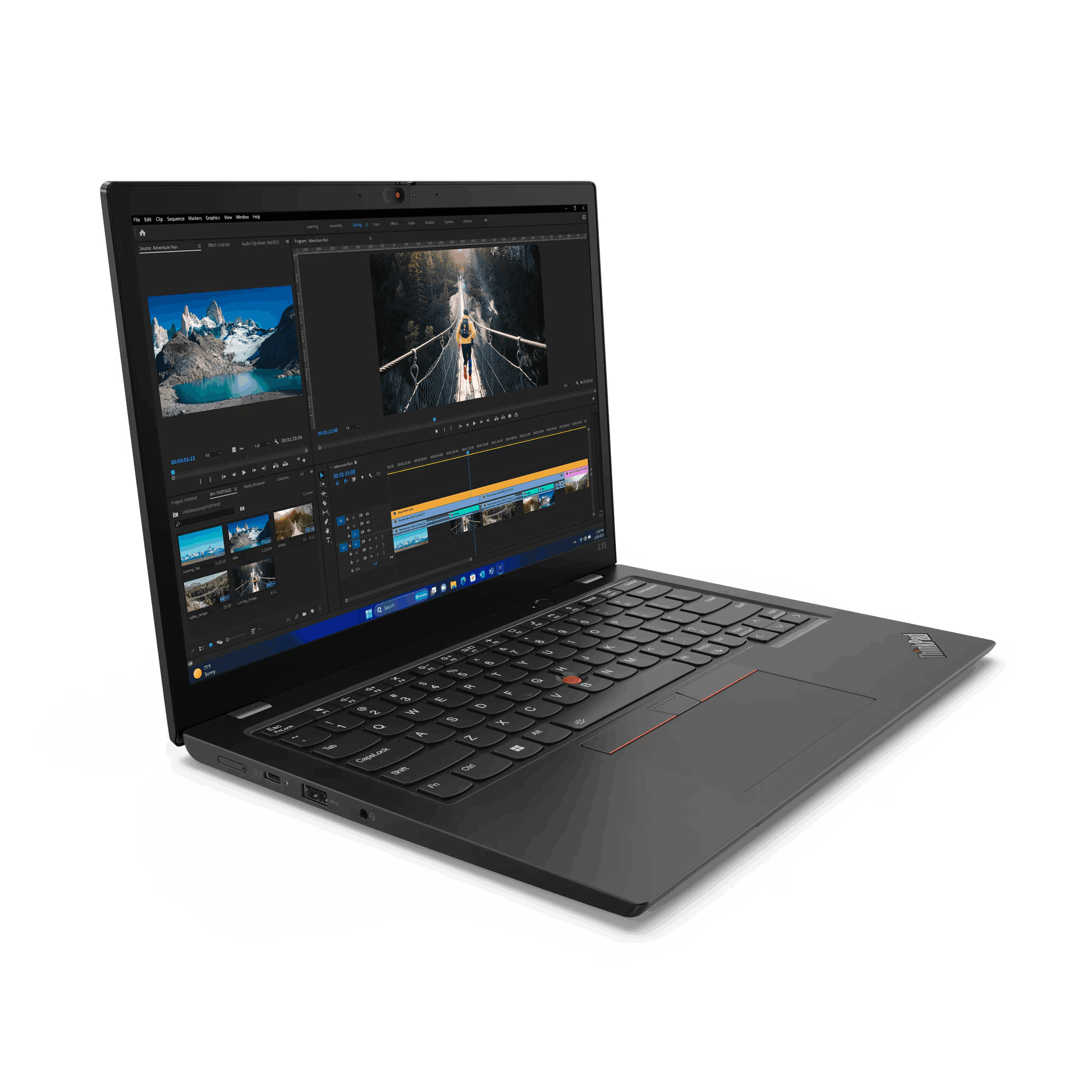 Portátil sobre superficie negra. Pantalla muestra interfaz de edición de video. Acento rojo en el trackpad.