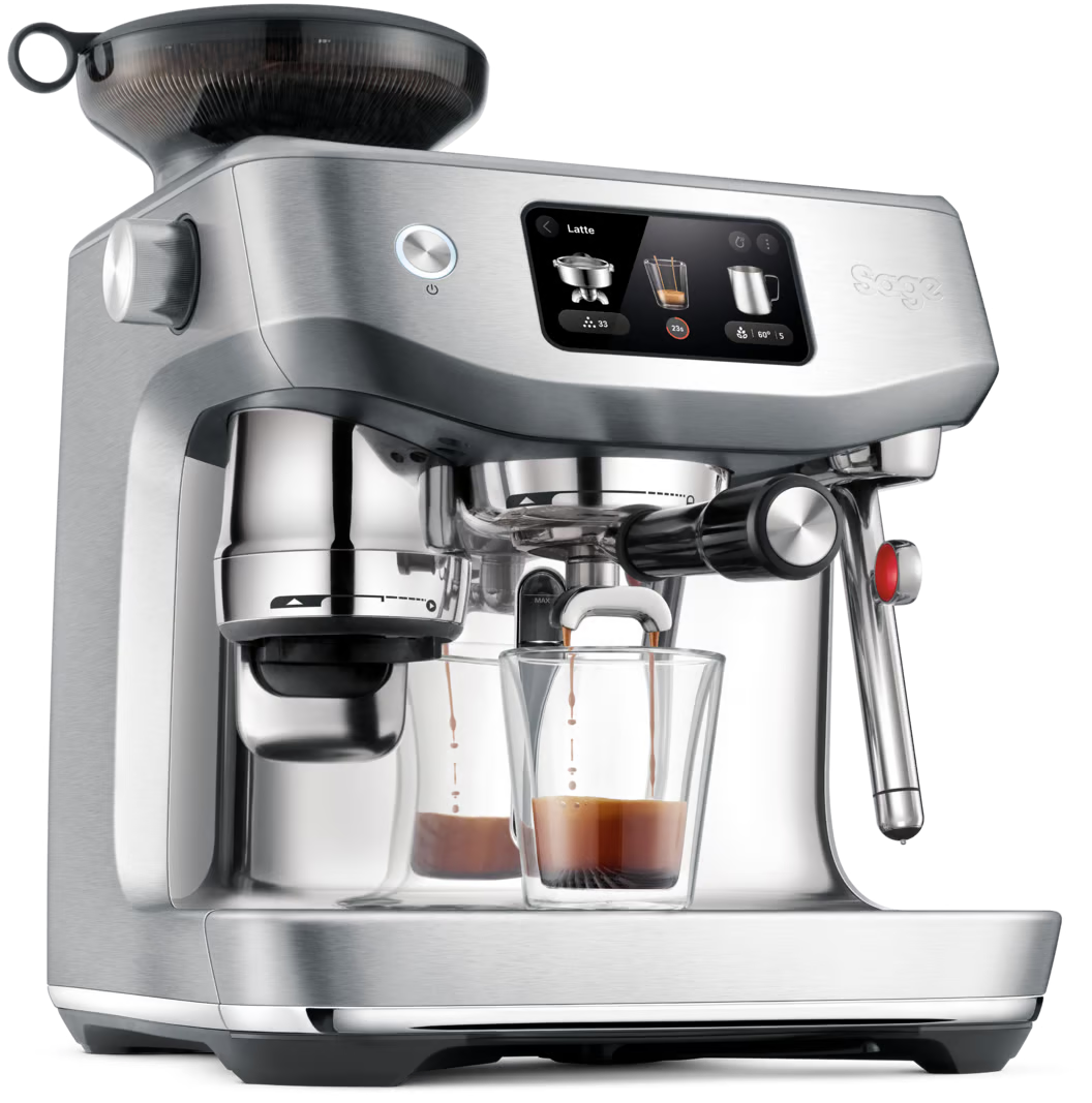 Macchina per espresso argentata con due bicchieri che si riempiono di caffè. Ha uno schermo e un macinacaffè.