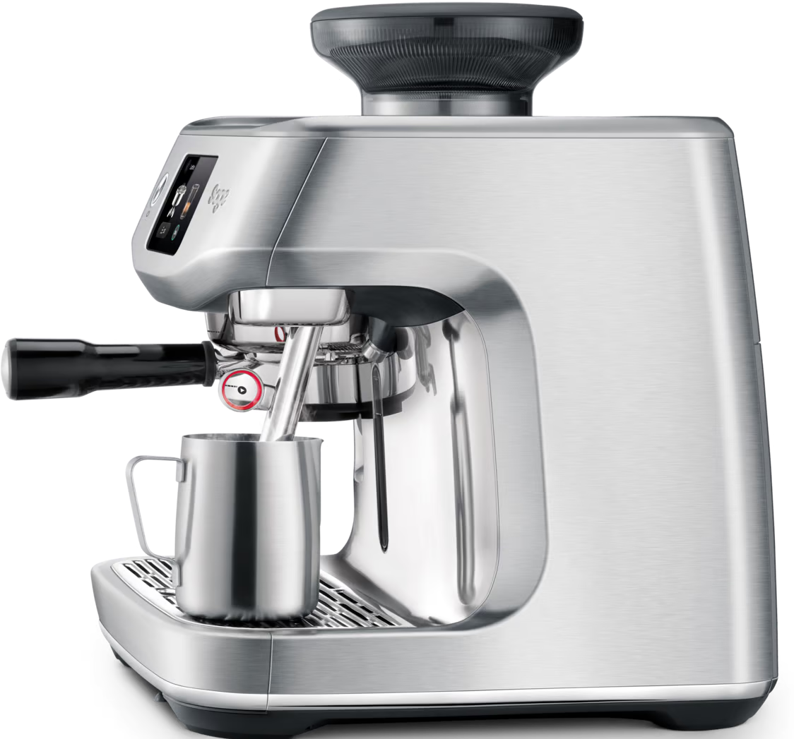 Macchina per espresso argentata con macinacaffè integrato e caraffa per latte.