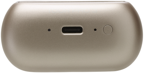 Közelkép egy arany színű eszközről, USB-C porttal és egy gombbal.