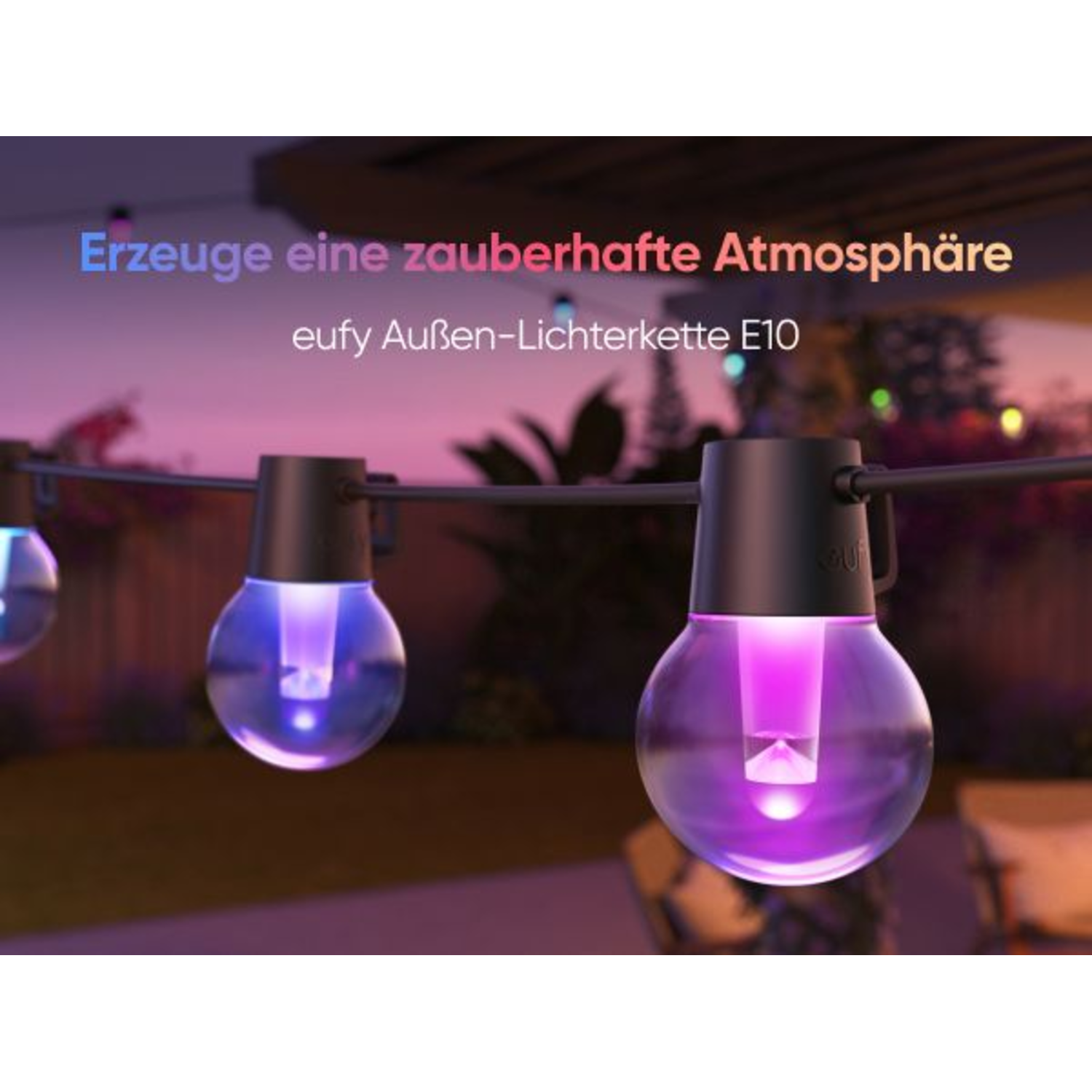 String of glowing purple light bulbs on a dark background.