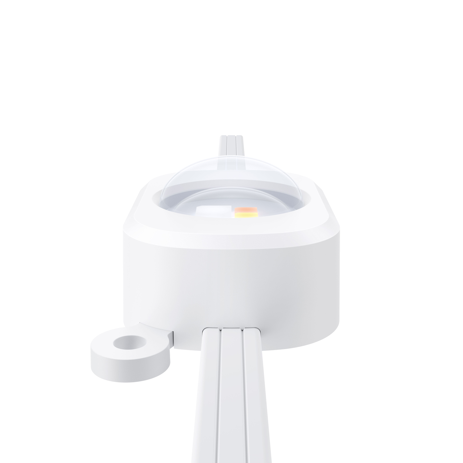 White device with a clear dome. A small light is seen. It is on a white surface.