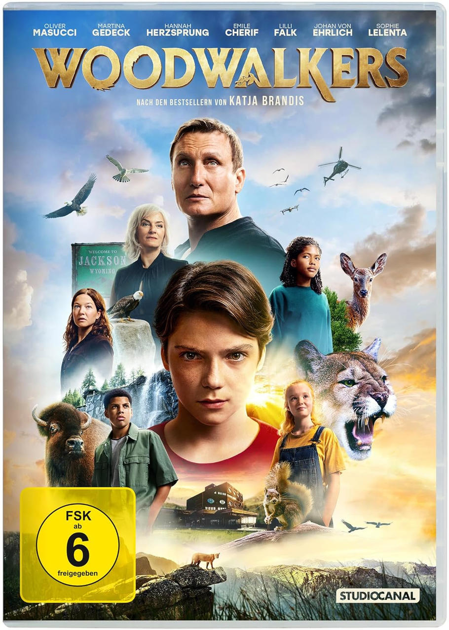 Filmposter mit Schauspielern, Tieren und Text. Zeigt einen Jungen, der nach vorne schaut. Blau-, Grün- und Brauntöne.