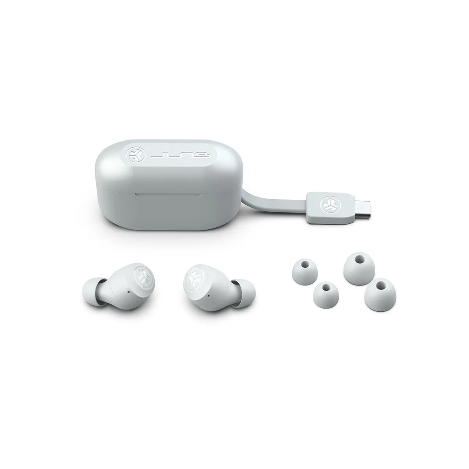 White earbuds, a charging case, and extra ear tips are shown on a white surface.