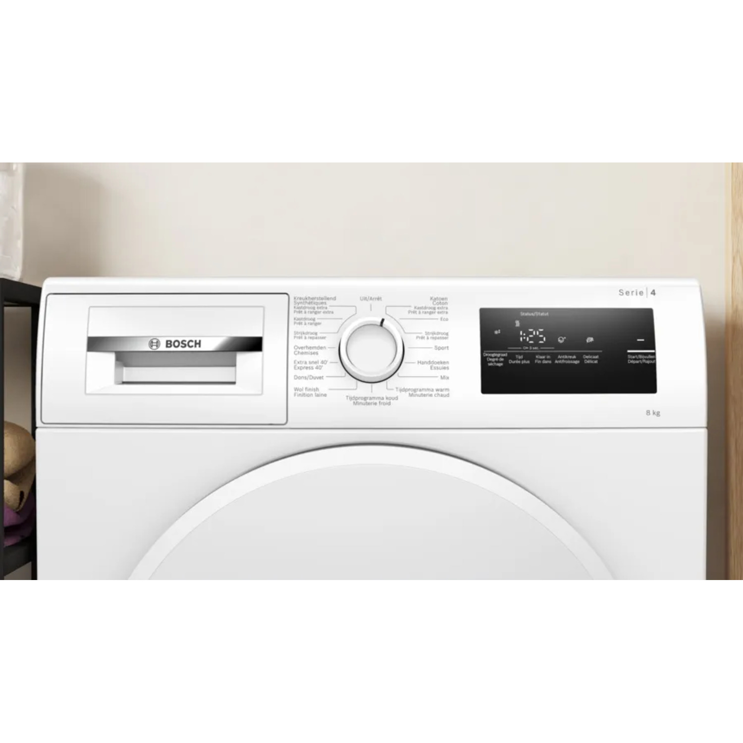 White Bosch washing machine control panel with various program options and display.