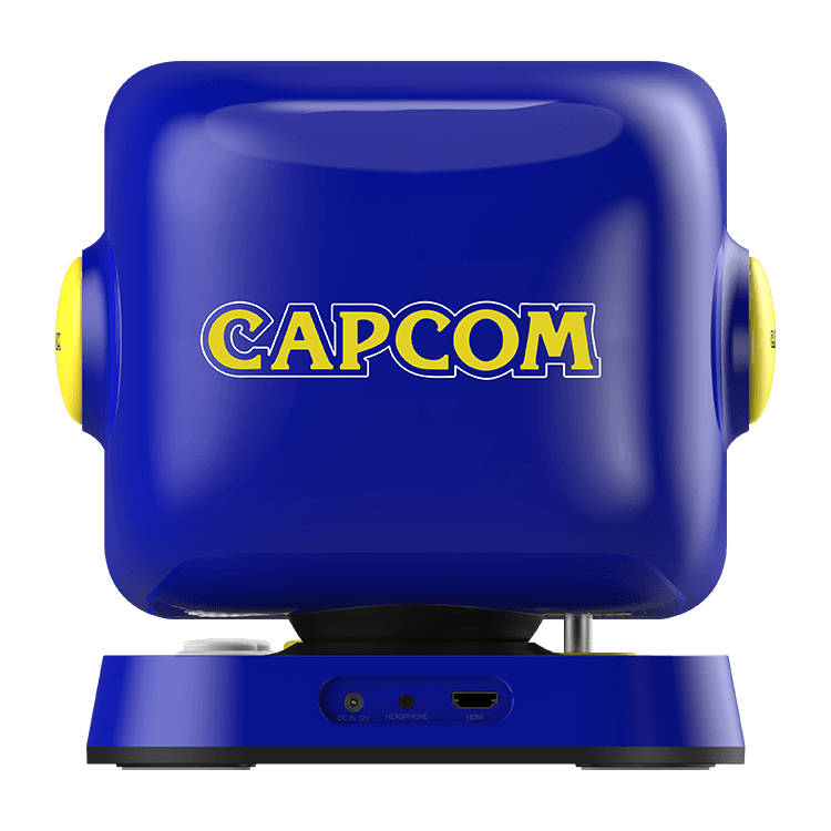 Dispositivo cuadrado azul con lados amarillos y logotipo blanco de Capcom.