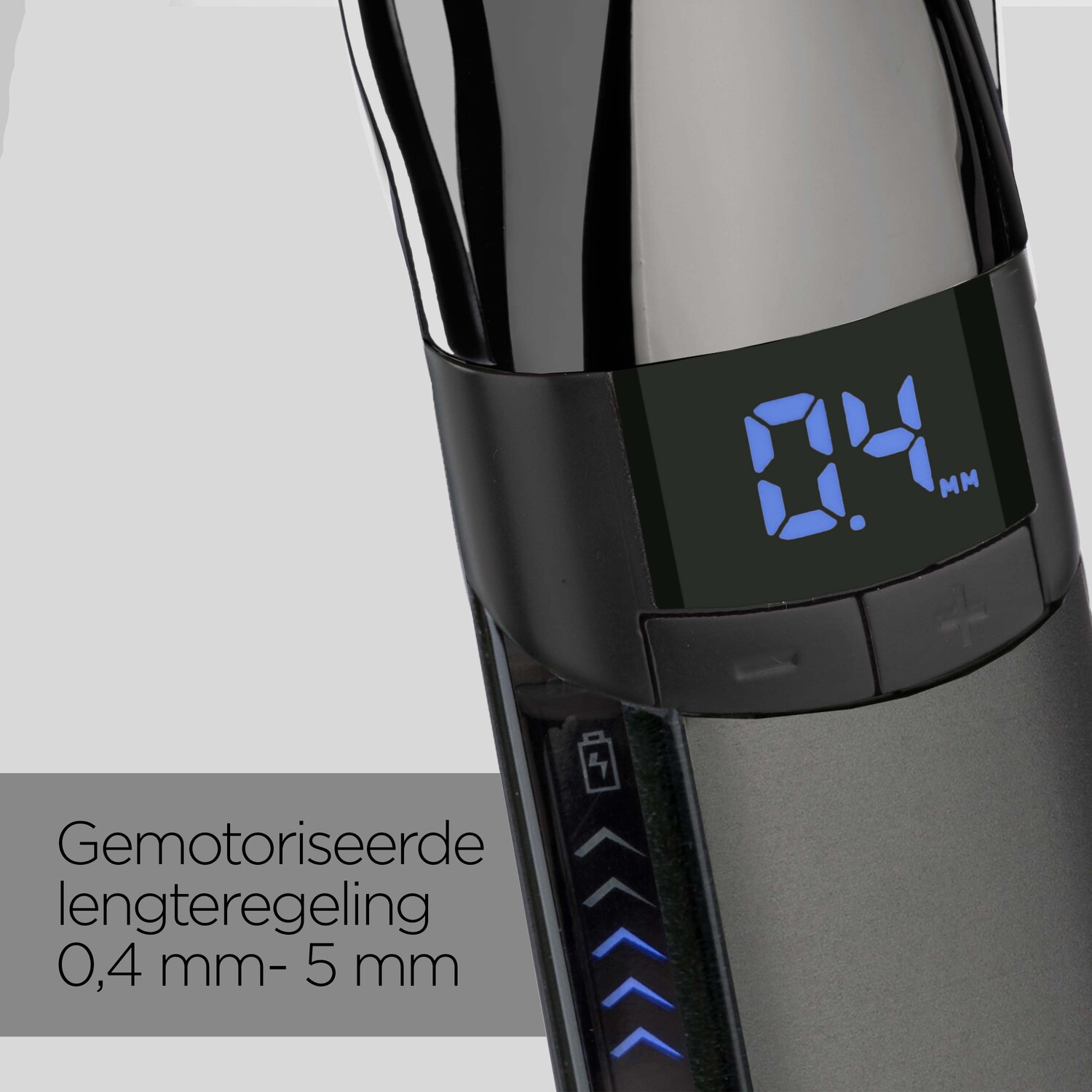 Close-up of a beard trimmer showing settings. A digital display shows the length in millimeters.
