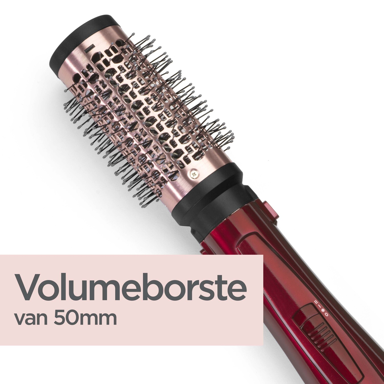 Hairbrush with a red handle and metal barrel. Text overlay says "Volumeborste van 50mm".