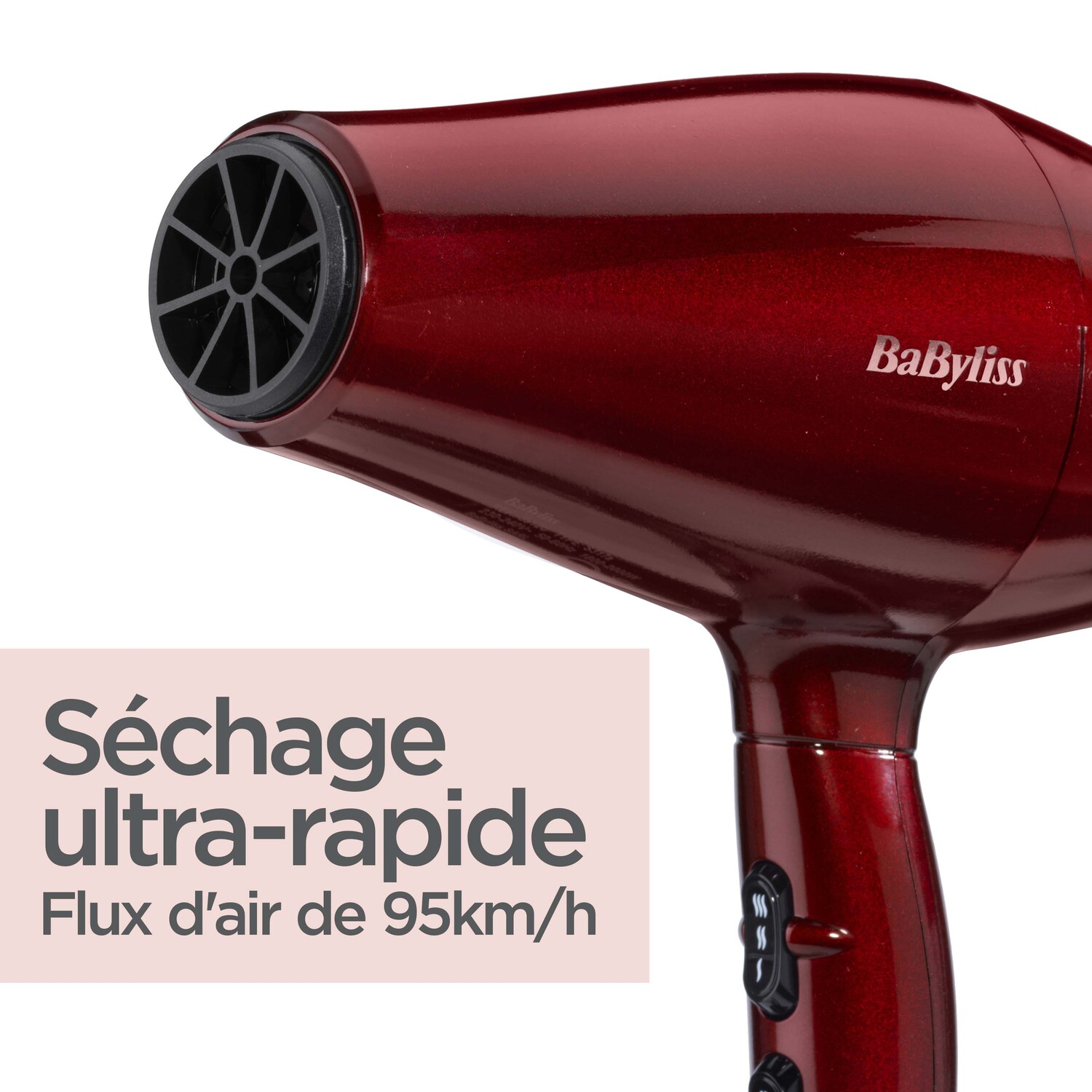 Sèche-cheveux rouge avec buse et boutons noirs. Le texte indique un séchage ultra-rapide.