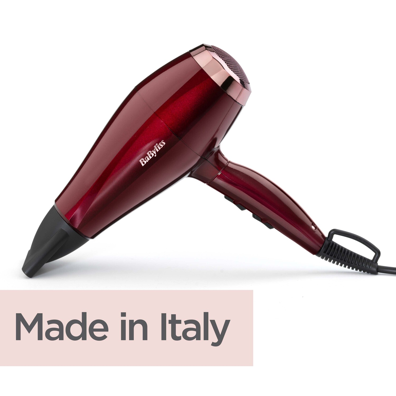 Sèche-cheveux rouge Babyliss sur blanc, avec texte "Made in Italy".