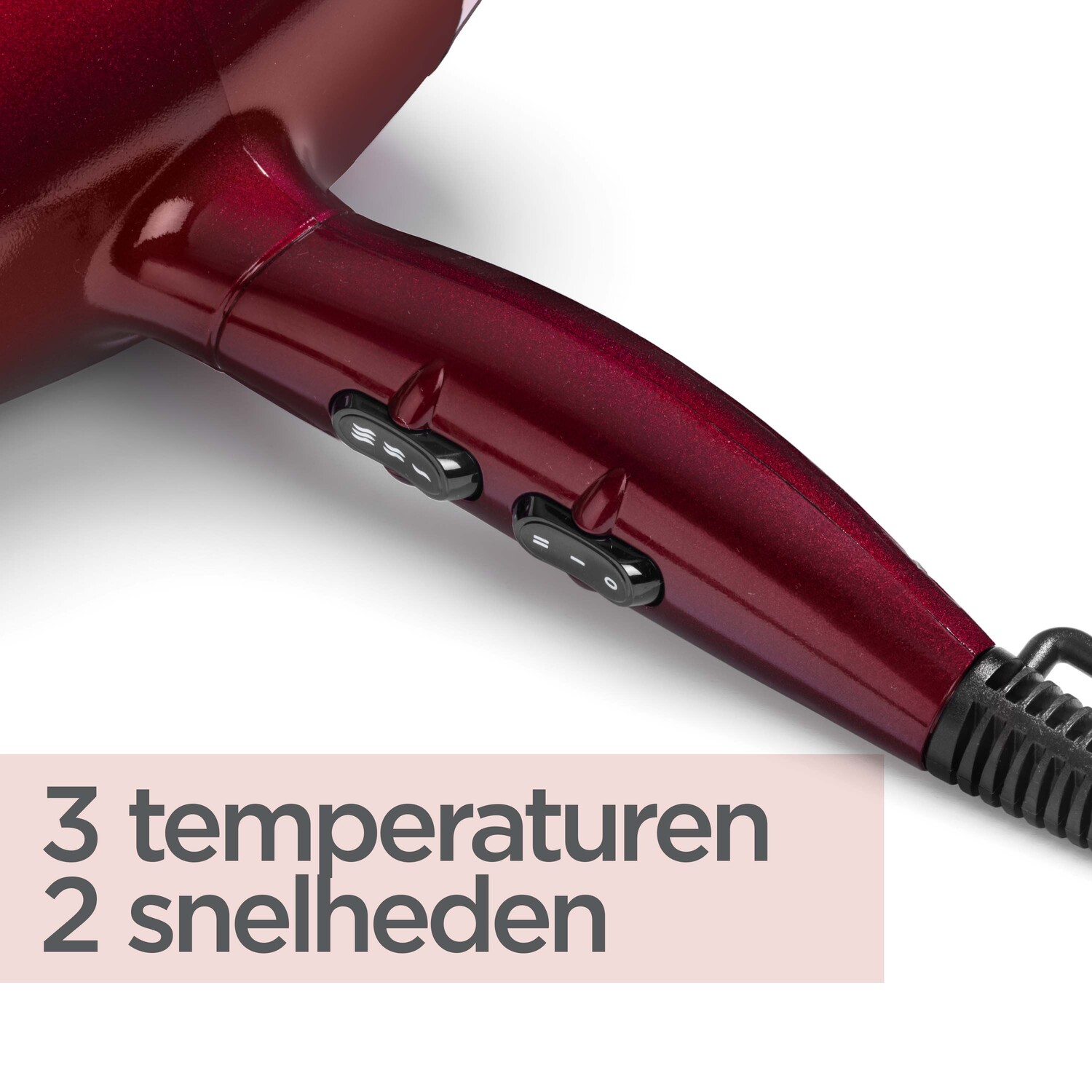Een rode haardroger met bedieningsknoppen. Tekst in het Nederlands: "3 temperaturen 2 snelheden".