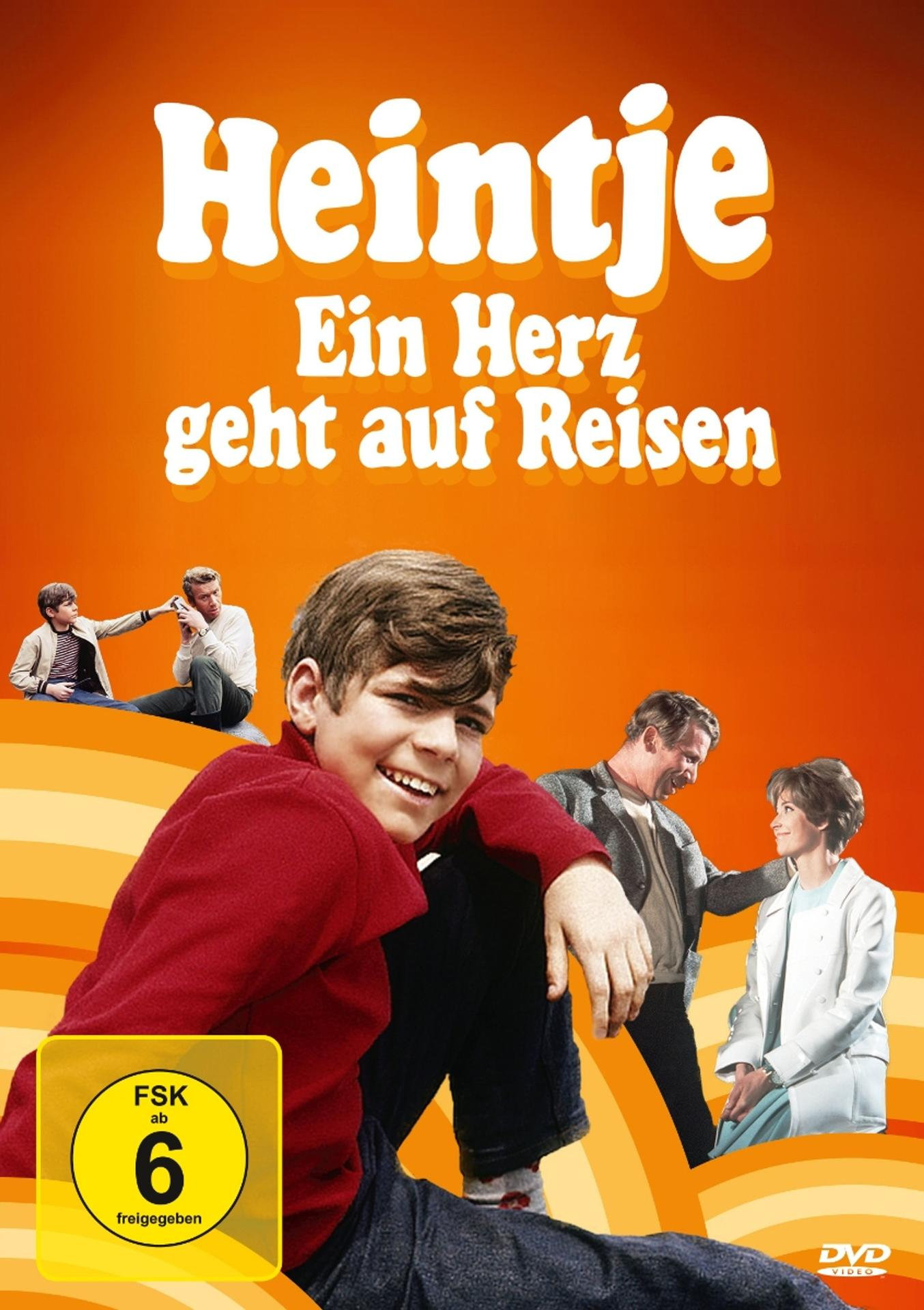 Filmposter mit lächelndem Jungen in Rot. Titel: Heintje, Ein Herz geht auf Reisen. Oranger Hintergrund.