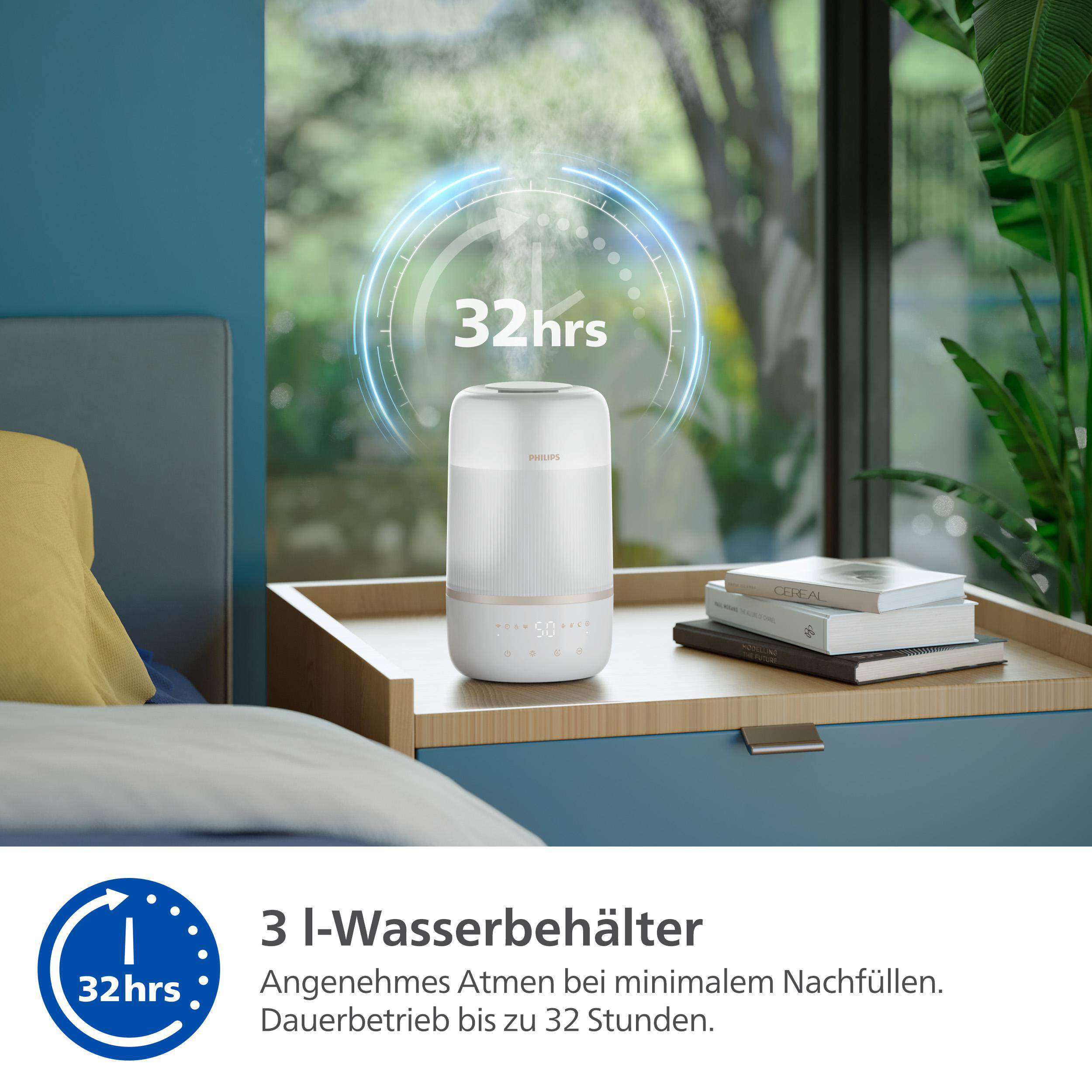 Weißer Luftbefeuchter auf einem Nachttisch mit beleuchtetem Display und Büchern.
