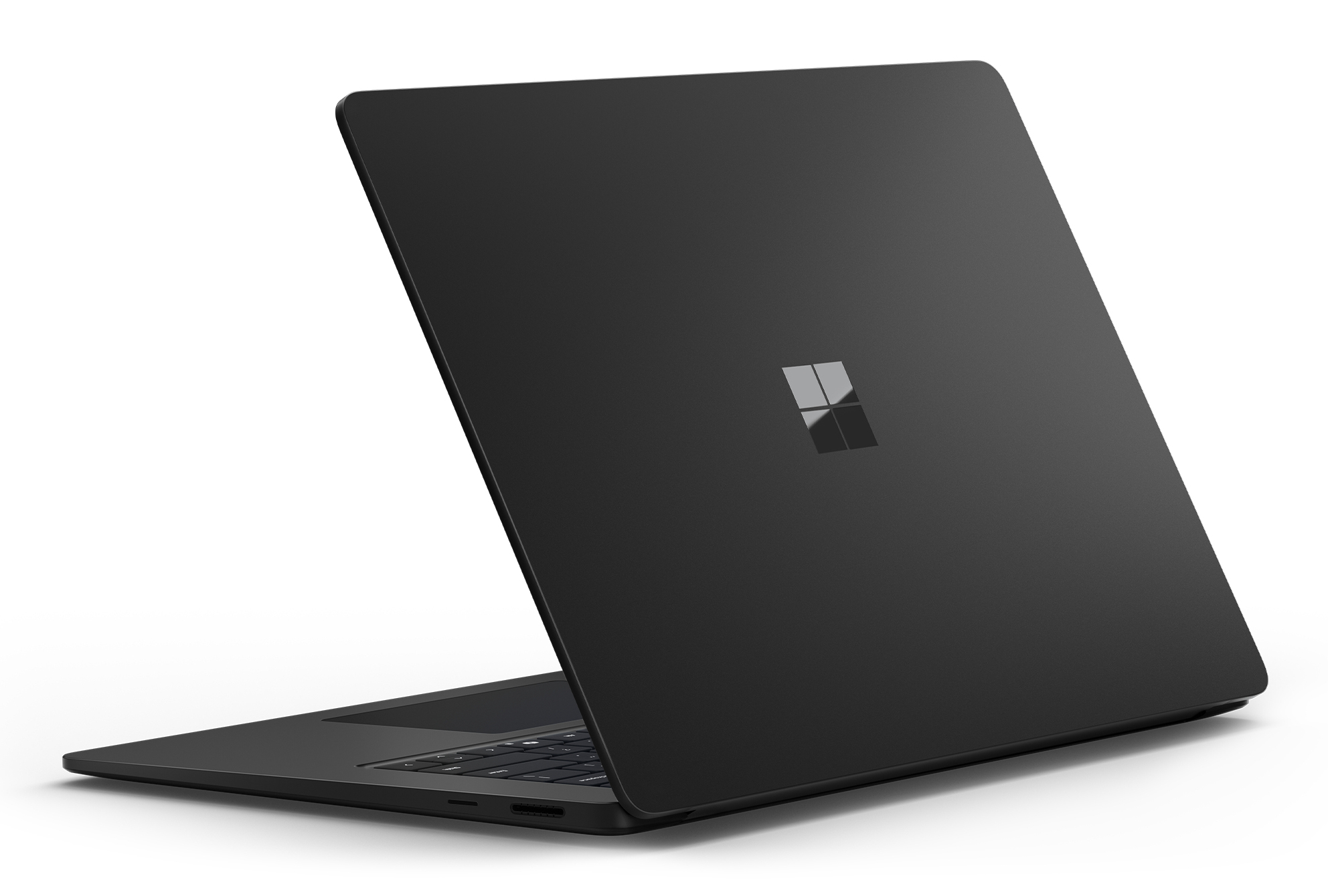 Ein schwarzer Laptop mit einem Microsoft-Logo auf der Rückseite.