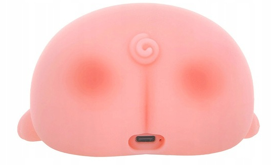 Różowy tyłek z kreskówek z portem USB. Białe tło.