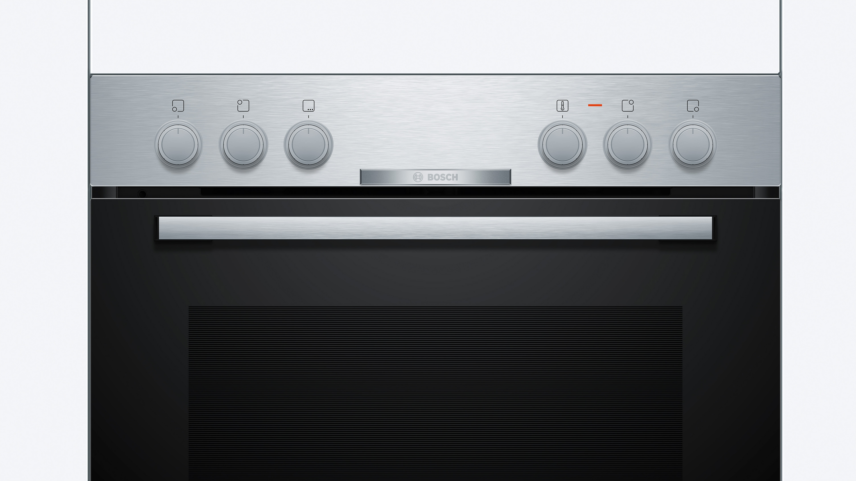 Ein Edelstahlbackofen mit Knöpfen und einem Griff. Der Backofen hat eine schwarze Tür und eine silberne Bedienblende.