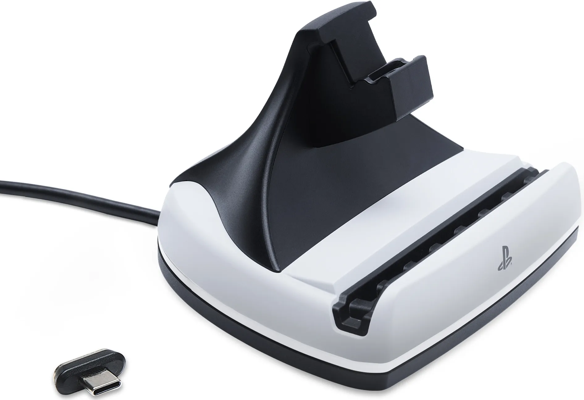 Station de charge de manette PS5 blanche et noire. Un adaptateur USB-C à côté.