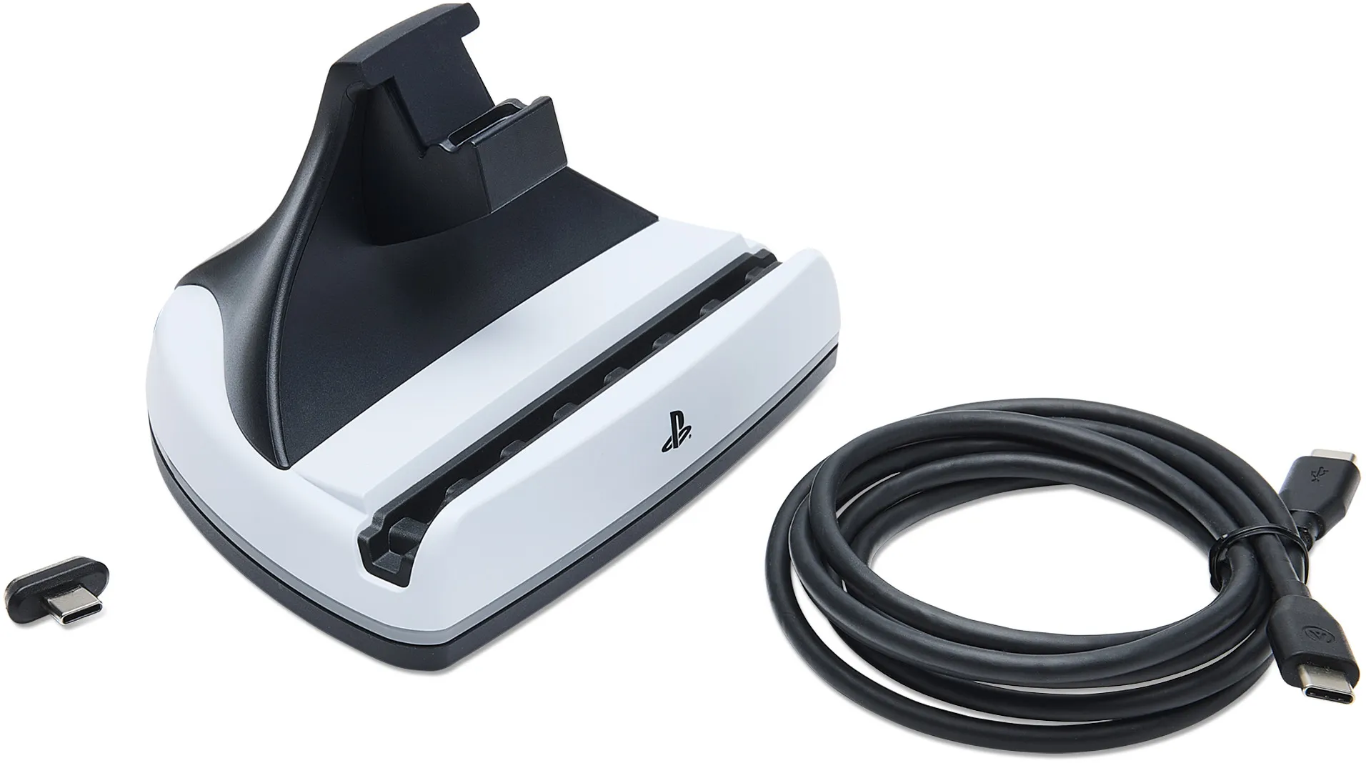 Une station de charge de manette PS5 blanche et noire avec câble USB-C et adaptateur.