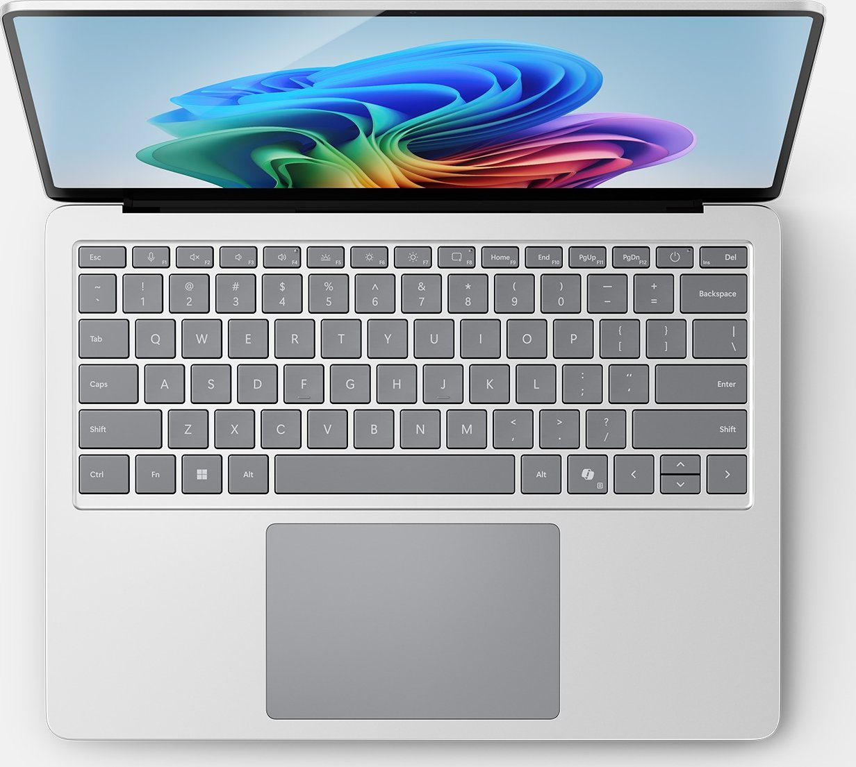 Ein Laptop mit farbenfrohem Bildschirm und grauer Tastatur ist geöffnet.
