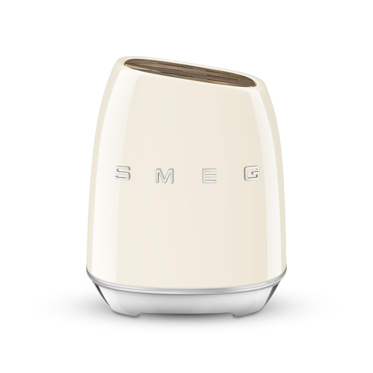 Smeg Toaster. Cremefarbenes Retro-Design mit Chromsockel und dem Wort 'SMEG' in silbernen Buchstaben.