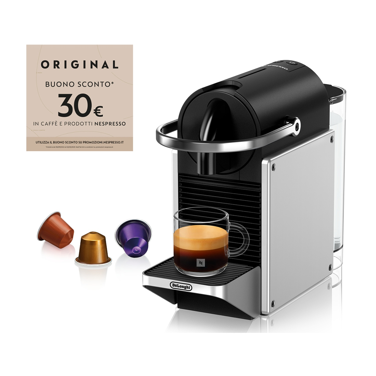 Macchina per espresso con tazza di caffè, capsule e buono sconto.