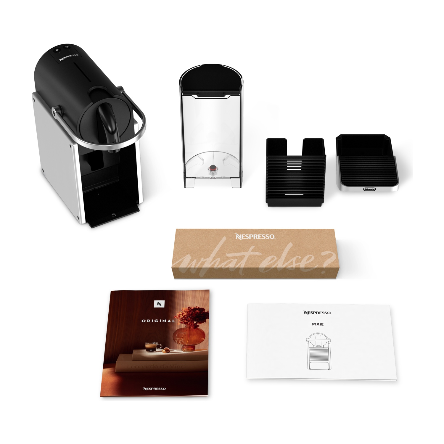 Componenti della macchina da caffè Nespresso, inclusi macchina, scatola e manuali.
