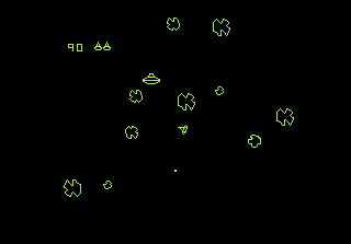 Retro-Videospielgrafik: Grüne Raumschiffe und Formen auf schwarzem Hintergrund.