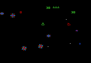Ein Screenshot aus einem Retro-Videospiel, der einen schwarzen Hintergrund mit bunten Pixelgrafiken zeigt.