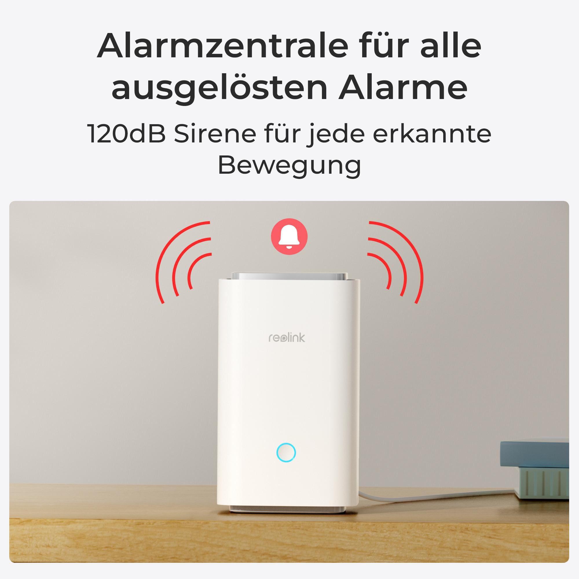 Weißes Sicherheitsgerät mit roten Alarmsymbolen und Text auf Holzoberfläche.