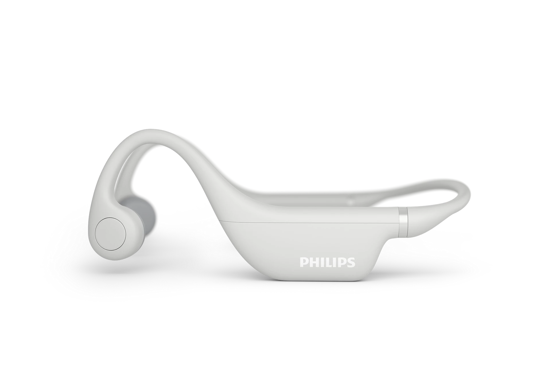 Beyaz kemik iletimli kulaklıklar. Kulağın etrafına sarılırlar. Philips markası görünür.