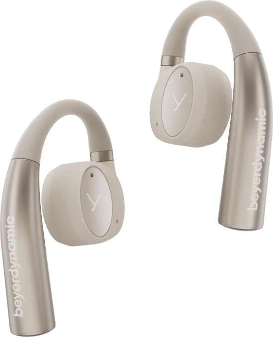 Zwei kabellose, beige Kopfhörer mit gebogenen Armen, beyerdynamic-Logo sichtbar.