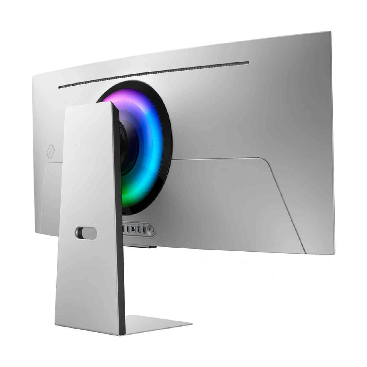 Un moniteur d'ordinateur argenté vu de dos. Il a un design incurvé et un anneau lumineux coloré à l'arrière.
