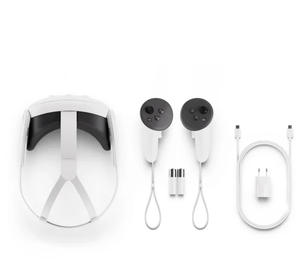 Biały zestaw słuchawkowy VR, dwa kontrolery, dwie baterie AA, kabel do ładowania i zasilacz na białym tle.