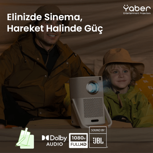 Bir adam ve bir çocuk bir projektörün yanında duruyor. Metin şöyle diyor: Elinizde Sinema, Hareket Halinde Güç.