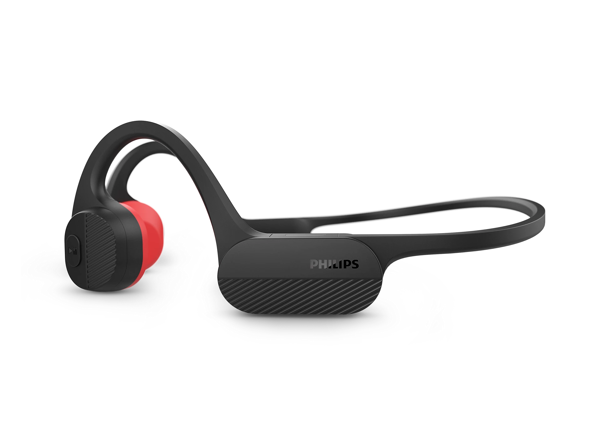 Siyah ve kırmızı Philips kemik iletimli kulaklıklar. Kulağın ve başın etrafına sarılırlar.